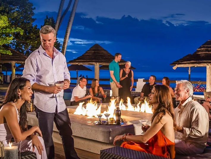 Sandals Resort Poolside gathering of adults