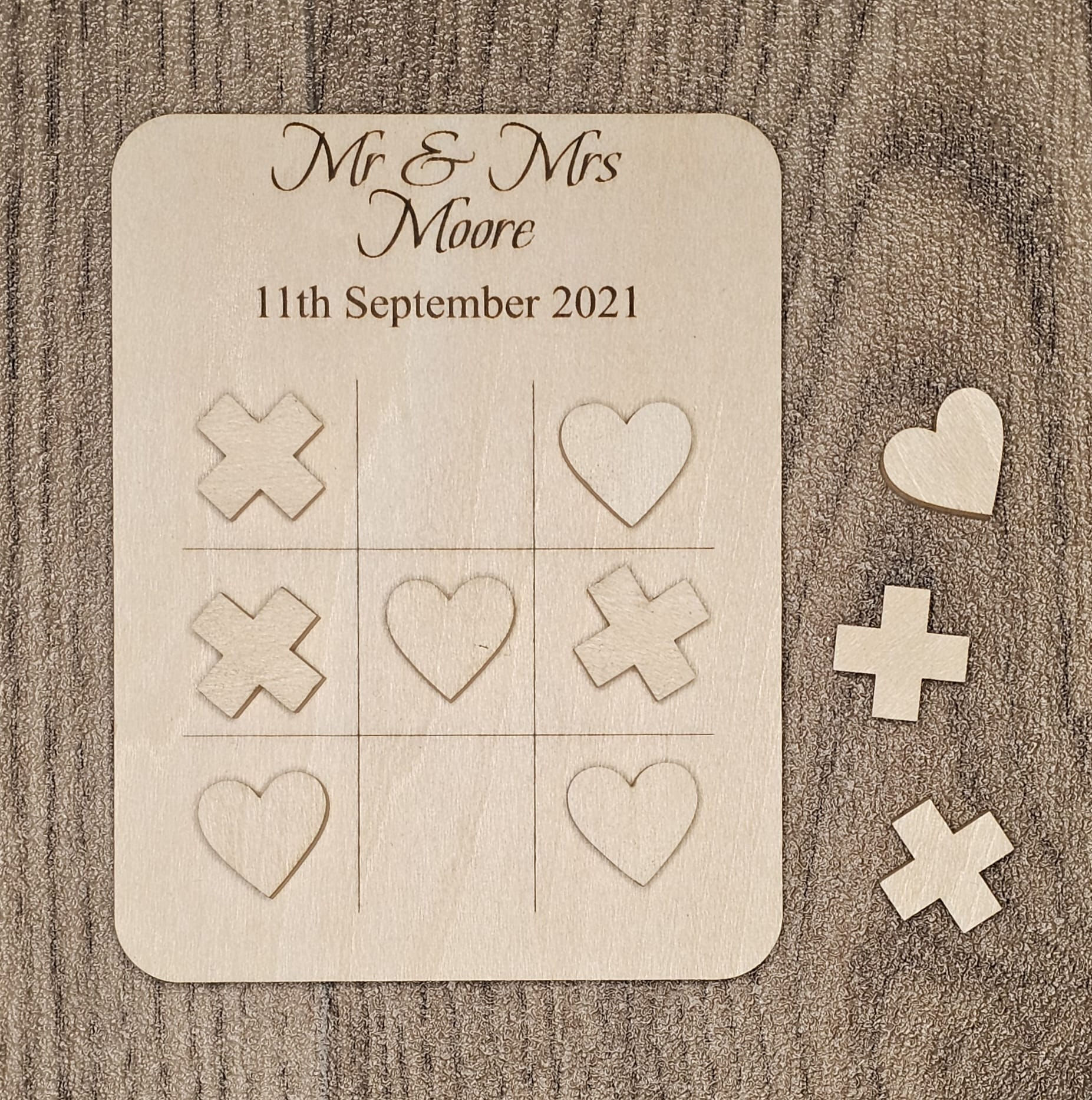 Personalised laser engraved gifts including wedding hangers , glassware, coasters, keyrings, bookmarks and wooden keepsakes