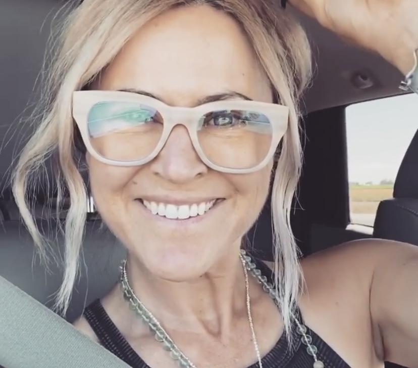 Azure, in the car with glasses on. Her hair is pulled up and she is smiling taking a selfie. Azure, in the car with glasses on. Her hair is pulled up and she is smiling taking a selfie.
