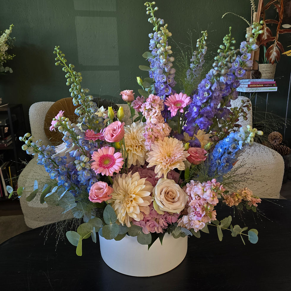 Thumbnail: Designer's Choice Flower Arrangement in a Ceramic Container