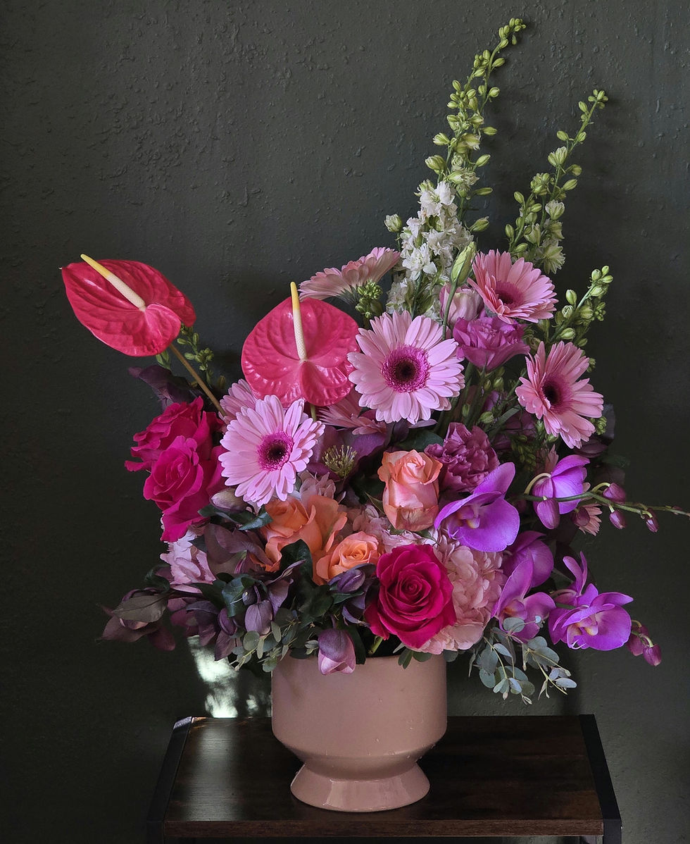 Thumbnail: Hydrangeas, anthuriums, and orchids in a ceramic compote