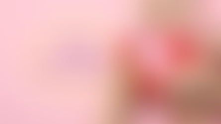 Hands holding a pink paper uterus decorated with red and pink paper flowers, representing the menstrual cycle and natural flow. Text overlay reads “Our Cycles & Nature’s Rhythms” inside a golden oval on a pink background. Megan Haggett created this image.