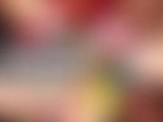 A circle of diverse women lying down with their heads together, adorned with colorful flower crowns, symbolizing unity, healing, and empowerment. Megan Haggett created this image.