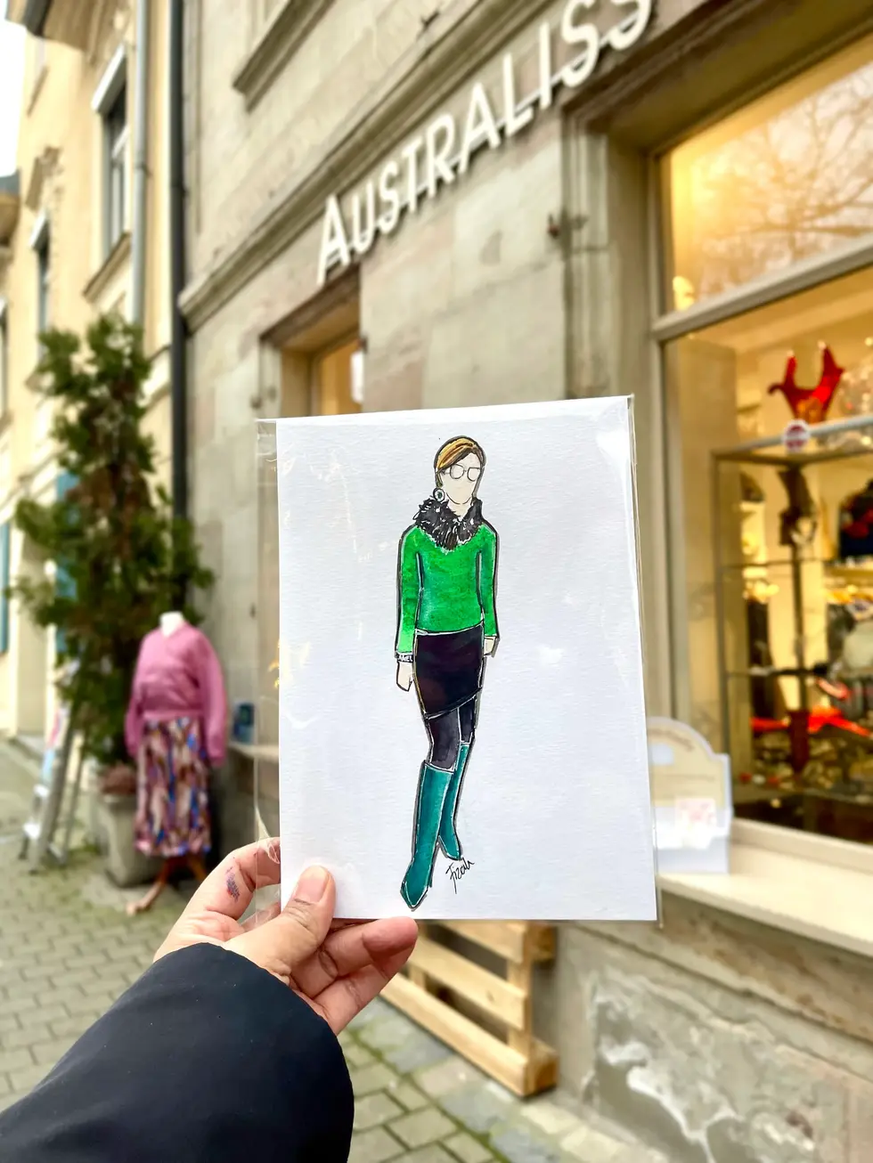 Faceless portrait of a stylish outfit sketched live by event illustrator Hafizah in Erlangen.