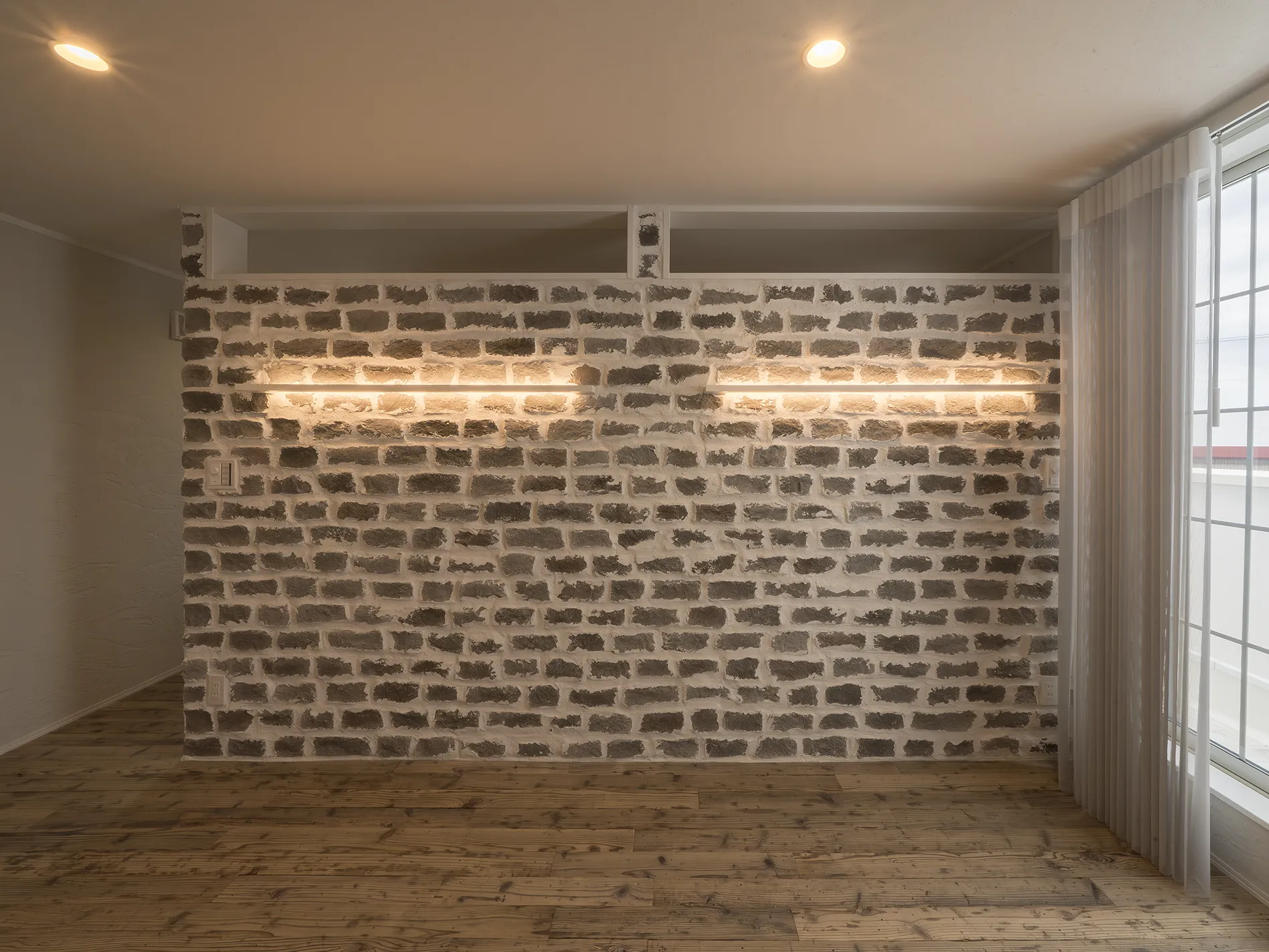 擬石タイルを使用した住宅