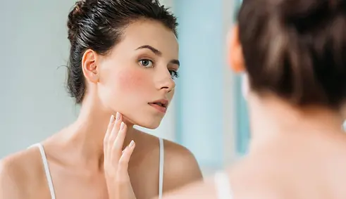 main_woman_w_flushed_skin.webp