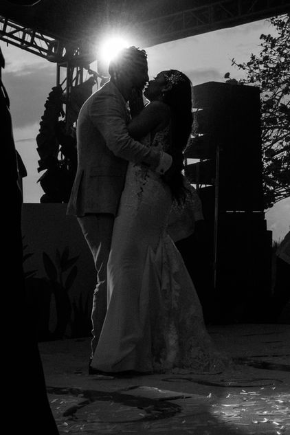bride and groom kiss on the dance floor of their destination wedding