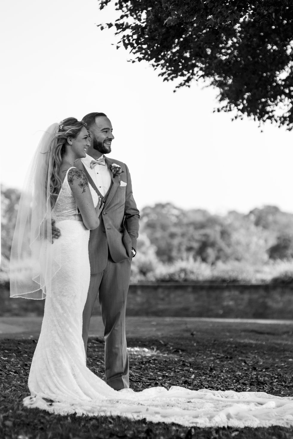 bride and groom posing for picture