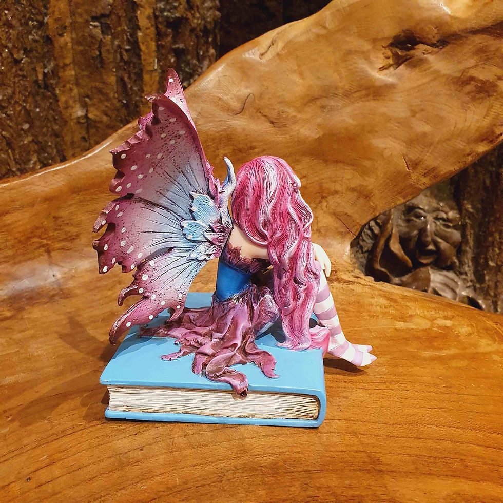 Thumbnail: fuchsia book fairy amy brown figurines elfje op boek beeldje