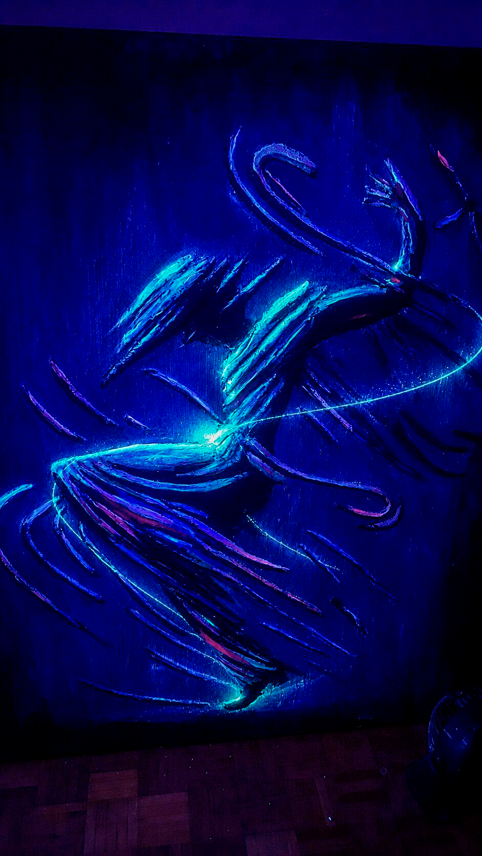 Rain artwork photographed under ultraviolet light