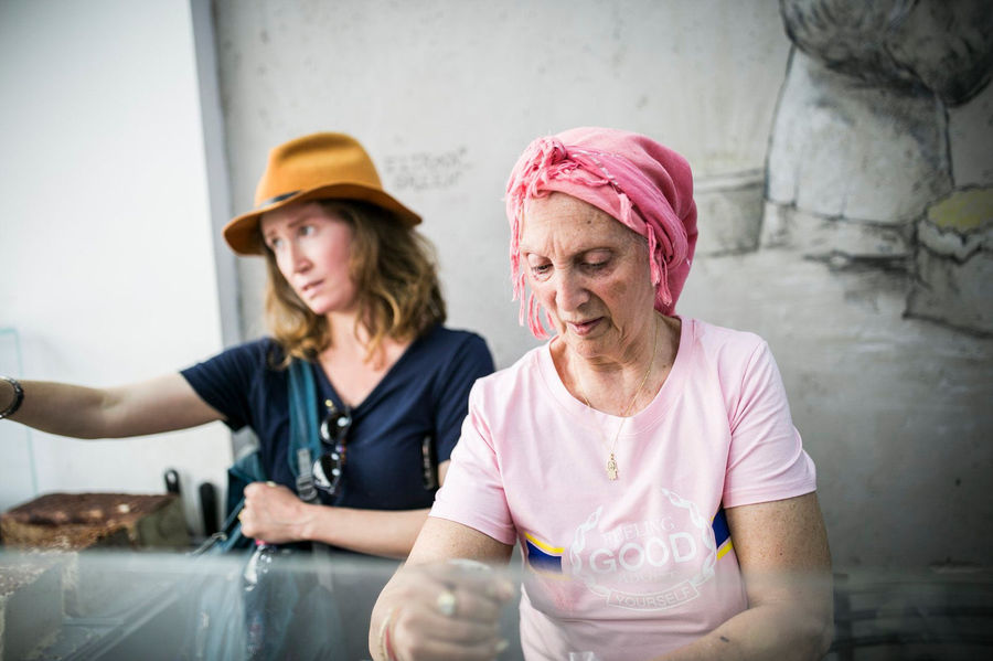 Hadara with a halva maker at her stall