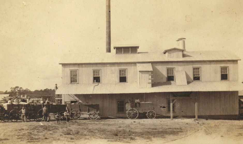 Vintage photo of the Texas Cotton Gin Museum building.