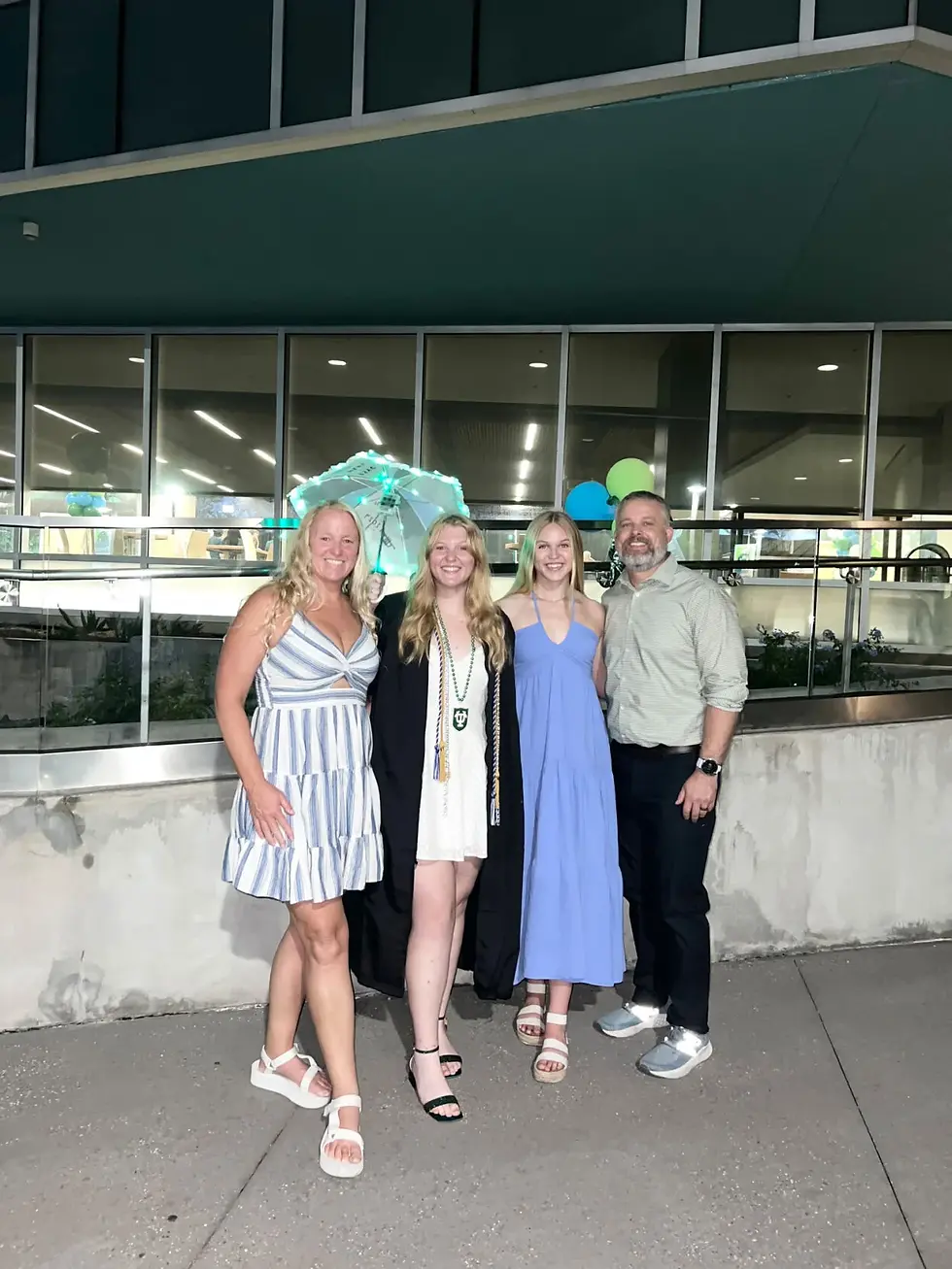 SCBP Lt. Cindy Fajardo, left, gathers with daughters Luanna, center-left, and Carly, center-right, and her husband, Jason. Coastal Point • Submitted