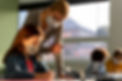 side-view-of-children-learning-in-school-with-teacher-during-the-pandemic.jpg
