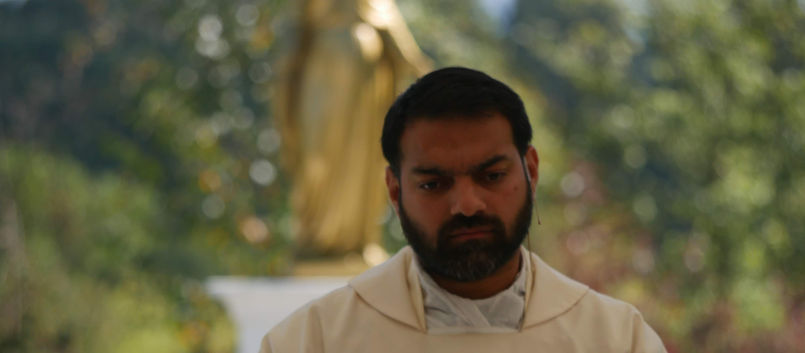 Fr Ben celebrates Mass with Mary behind.jpg