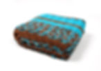 Side view of Mint Medley travel blanket with rich chocolate highlights