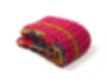 Folded view of Magenta travel blanket set with colorful hues