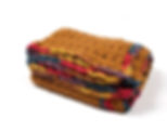 Side view of colorful edges of Cinnamon travel blanket