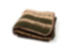 Side view of Chocolate Forest travel blanket with green and tan highlights