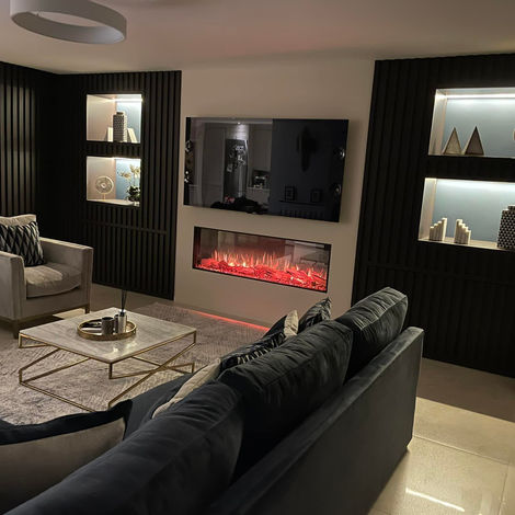Modern lounge with bespoke carpentry, fireplace and TV