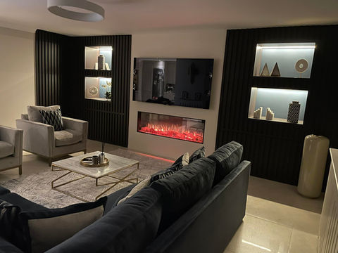 Modern lounge with bespoke carpentry, fireplace and TV