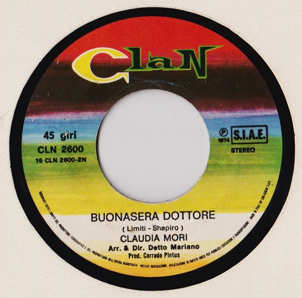 Thumbnail: Che Scherzo Mi Fai / Buonasera Dottore[Claudia Mori] - Vinyl 7", 45 RPM, Single
