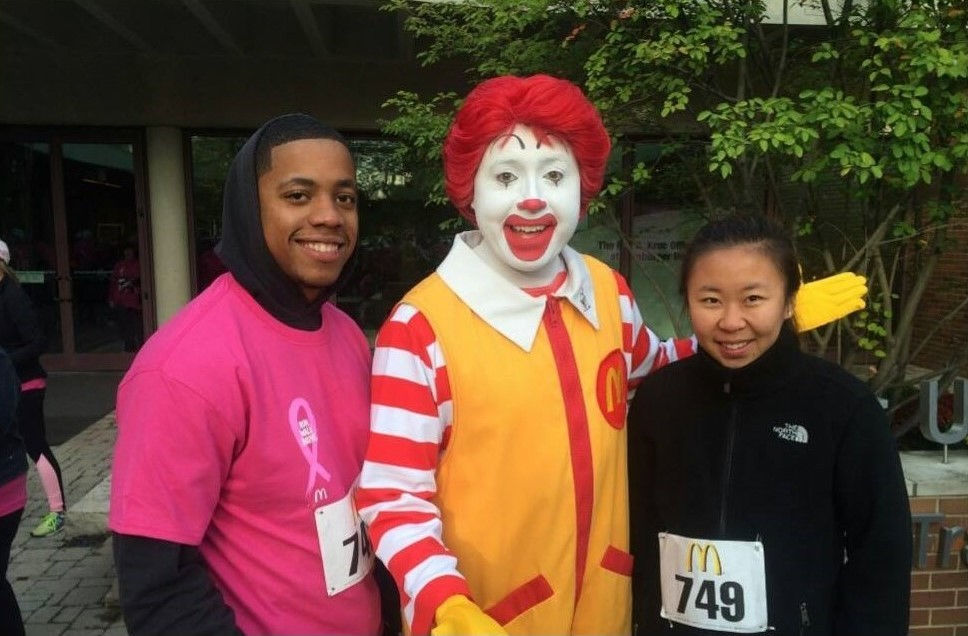 Jay posing with co-worker at McDonald’s 10K in 2015.