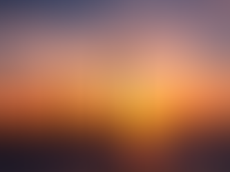 wind turbines silluoetted against a sunrise