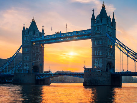 London tower bridge with sunrise behind it