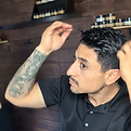 man styling his hair 