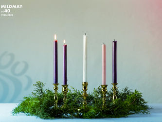 The second candle in the Advent crown is lit