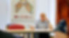 Geoff in meeting room with Mildmay mosaic.jpg