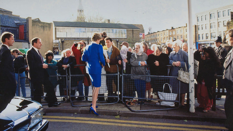 Diana, Princess of Wales, meeting locals outside Mildmay Hospital in 1989