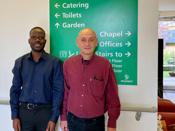 Dr Joseph Mwaka from Mildmay Uganda Institute of Health Sciences and Dr Simon Rackstraw, Mildmay UK' Medical Director
