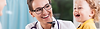 Smiling doctor and laughing child with medical tool, Patient Centered Approach.