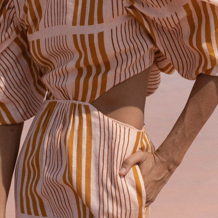 Woman in striped midi dress