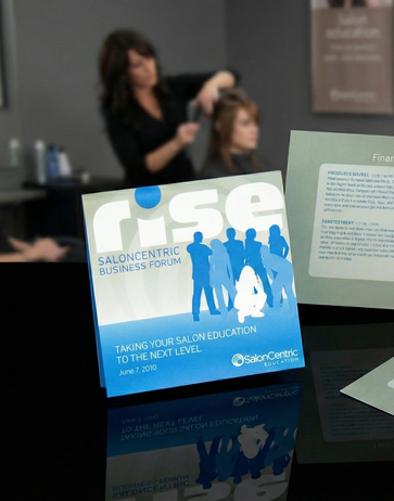 The "Rise" education brochure features a unique design that opens from all four sides, inviting users to explore its content. This innovative format promotes discovery, with vibrant visuals and engaging graphics that capture attention. The interior showcases essential information about educational offerings in a dynamic layout, encouraging stylists to interact with the brochure while reflecting SalonCentric’s commitment to creativity and professional growth in the beauty industry.