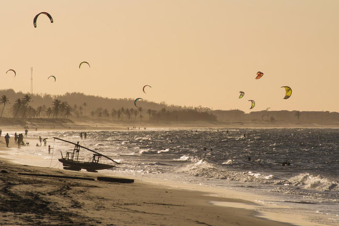 Kitesurfers at sunset during a Ventus trip in Brazil, Jericoacora