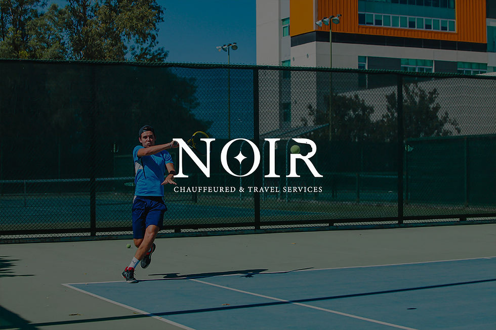 Tennis player performing forehand stroke on outdoor hard court with sports branding displayed in background.