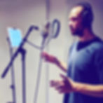 Eye-level view of a professional microphone in a recording studio