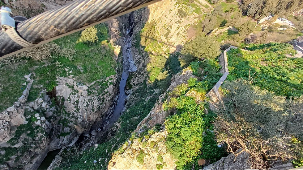 Scenic view of mountains with stream in Algeria
