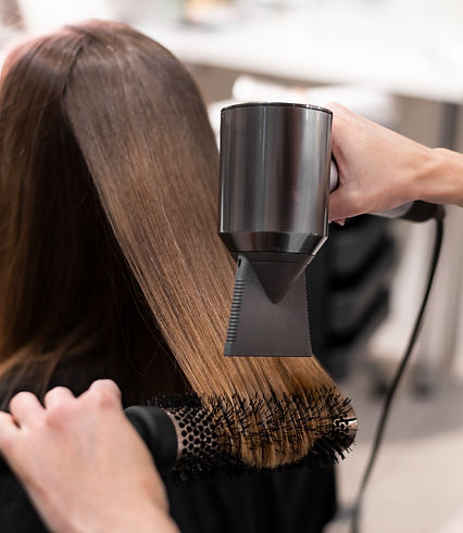 woman-getting-her-hair-done-beauty-salon.jpg