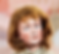 Antique red haired doll with blue eyes
