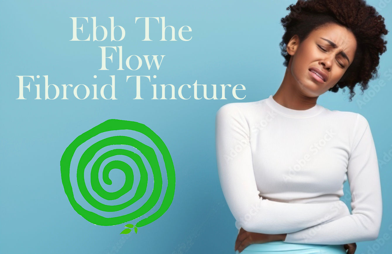 A woman that loos like she's in pain, holding her stomach.