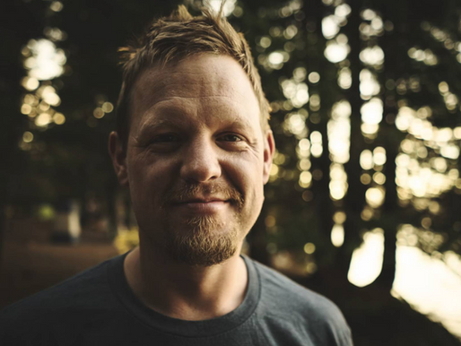 Happy, healthy man outdoors in natural light — representing the quality of life benefits of Easy Pee-sy Organic Prostate Support Tincture, formulated by Clinical Herbalist and former RN Donna Troy Cleary at Spiral Herbal Remedies Brooklyn"