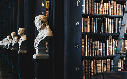 book lot on black wooden shelf_edited.jpg