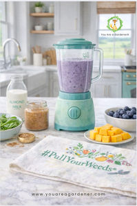 Ingredients for a calming blueberry smoothie arranged beside a blender on a kitchen counter, including almond milk, mango, blueberries, spinach, and a #PullYourWeeds® towel.