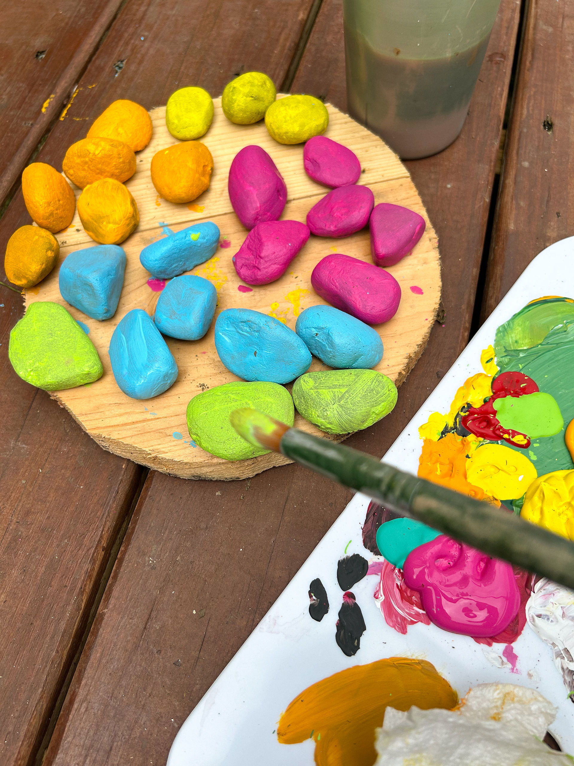 paint rocks to make a flower pattern with kids