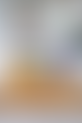 Blueberry smoothie ingredients arranged on a wooden cutting board engraved with a fox illustration, representing mindful preparation and nervous system regulation.