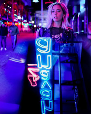 Cinematic portrait illuminated by blue neon light Budapest Photoshoot